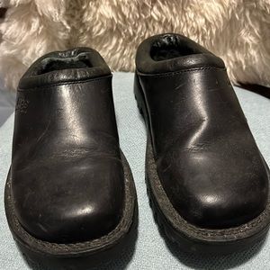 Black Ugg shearling lined leather slides